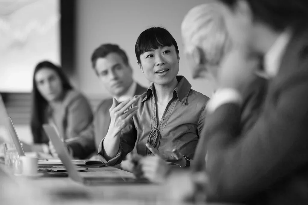 Business team discussing cloud DLP and data security during a meeting