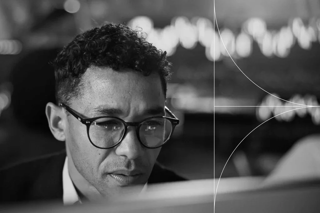 Cybersecurity professional monitoring a computer screen in a security operations environment