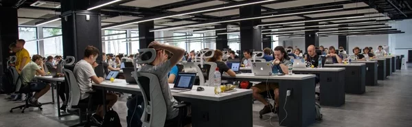 Large open office plan full of working people