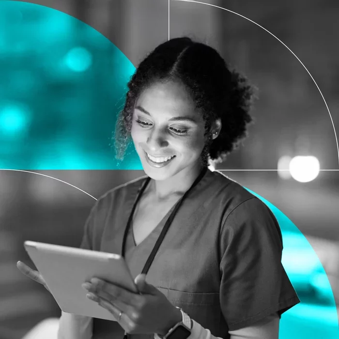 Healthcare professional using a tablet to access patient information