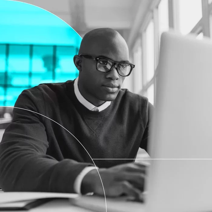Professional reviews digital information on a computer using e-discovery software.