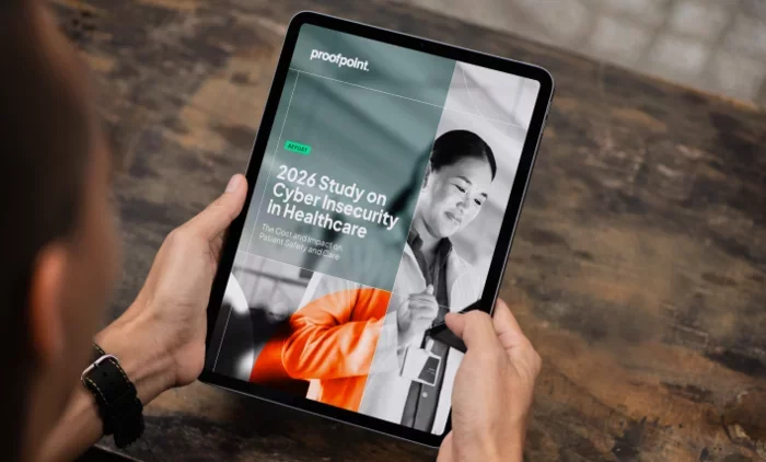 Tablet showing Proofpoint’s “2026 Study on Cyber Insecurity in Healthcare” report cover.