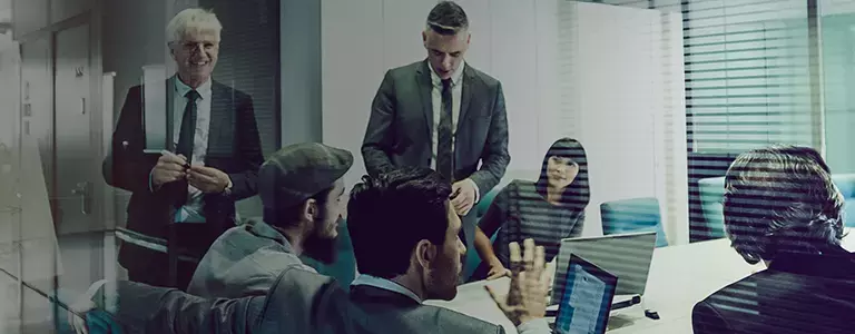 Employees Discussing Office 365 Security and Compliance Solutions