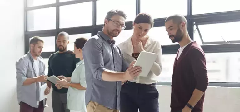 Colleagues Discussing Security and Archiving Challenges