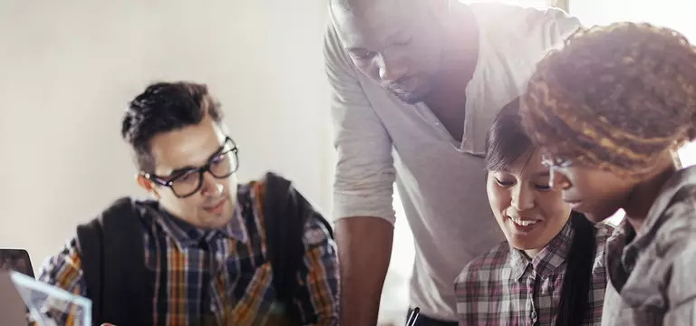 Male Co-workers Discussing Digital Risk