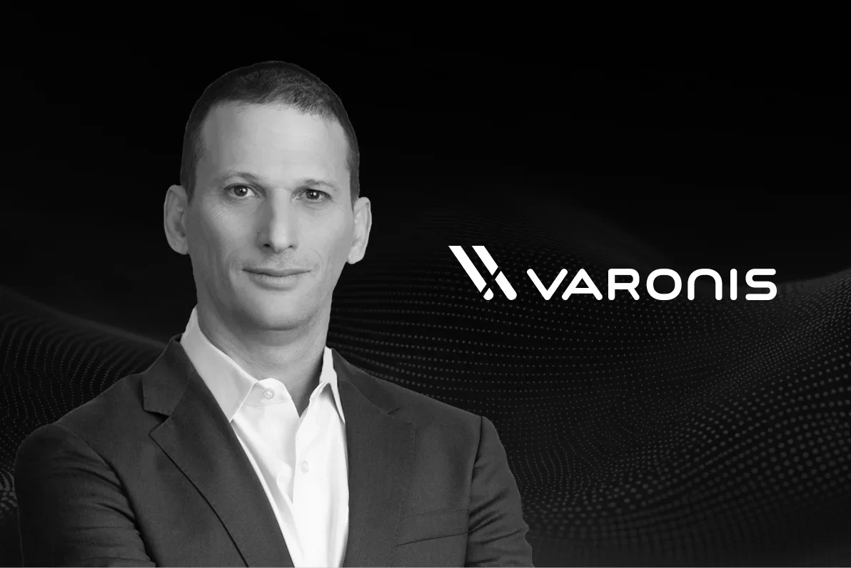 Black-and-white portrait of Yaki beside the Varonis logo