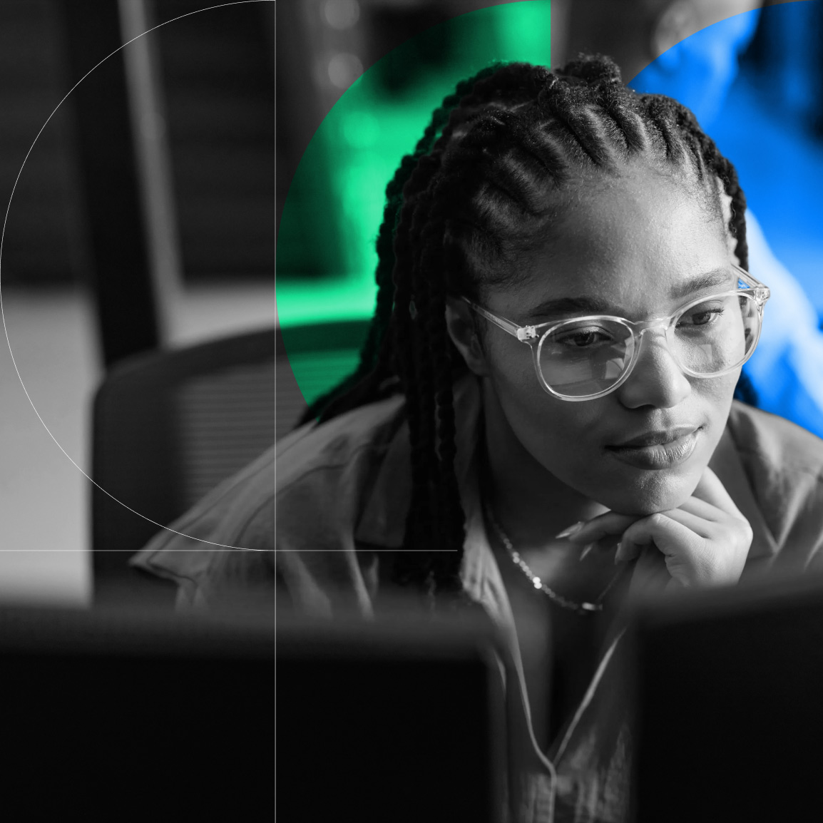 Security professional reviewing a screen, representing AI-powered email threat detection and protection.